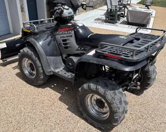  003 2002 Polaris Sportsman 700 Twin with Plow