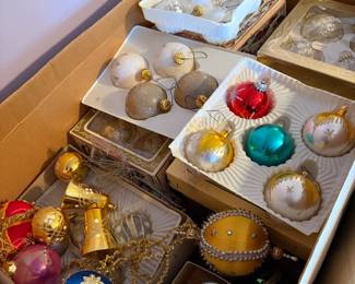 Vintage ornaments as well as vintage Christmas storage boxes