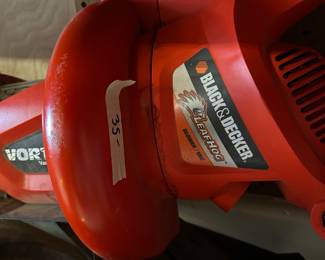 #143 Garage Black and Decker Blower and Vacuum - electric $ 35.00