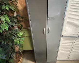 #126 Garage Metal 4 Shelf Cabinet 24x20x64 $ 60.00