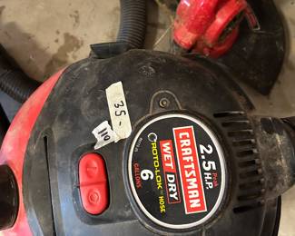 #110 Garage Craftsman 2.5 HP Shop Vac $ 35.00