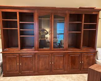 #46 Cabinet - LR Wood Hand-Crafted by Design Cabinet - 122" Wide 21"D x 32-85" Tall - consists of 3 pieces up Top and 1 solid piece top and bottom solid (unless you take molding off bottom) and You Move or Hire Movers - we will not help on this piece. Its great quality but heavy! $ 75.00