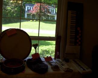 (lousy picture) of shamanic/native american style natural hide head drum - vtg mizwad tunisian bagpipe of goat skin and cow horns - moroccan 3 string gunibri made of tortoise shell - casiotone ct 510 electronic keyboard - midi cybersound keyboard - etc