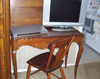 desk - chair - dvd player - tv