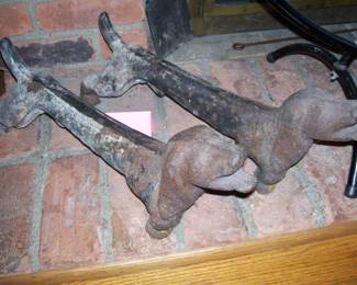 antique cast iron dachshund boot scraper or andirons