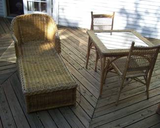 wicker/bamboo chaise and table with glass top & chairs. outside for the 1st time