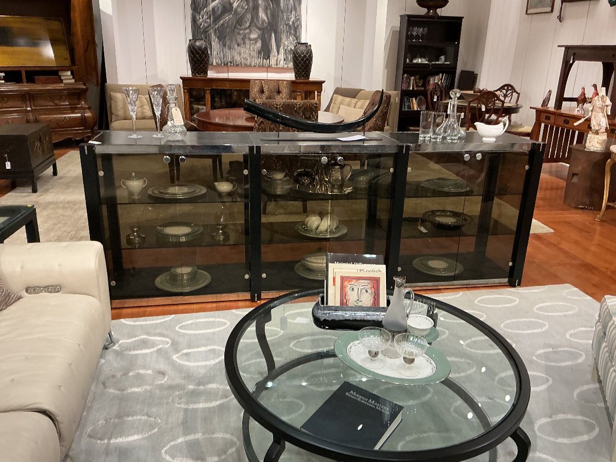 Contemporary Black Lacquered Credenza / Sideboard Description: A sleek, modern four-door buffet featuring a satin black lacquered finish, oversized industrial-style cylindrical door handles, and clean plinth base styling. Estimated Dimensions: Width: 72" Depth: 18" Height: 34"