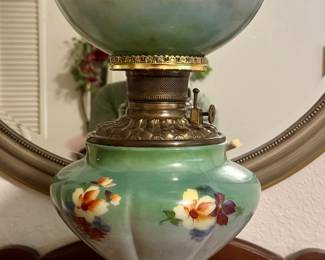 Victorian “Gone With the Wind” kerosene oil lamp with floral pattern.