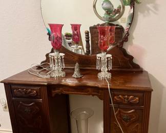 Antique Jacobean Revival vanity table. Carved details and attached mirror. Circa 1900-1920.