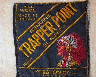 90" x 72" four point Hudson Bay type blanket by T. Eaton Co Ltd, Canada (made in England). With woven label dating the blanket to the1920s to 1930s. In excellent condition with no moth or other damage.