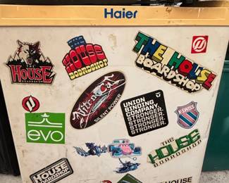 Haier Mini Refrigerator with Assorted Action Sports Stickers The House Boardshop, Evo, Nitro, KSwiss, Red Bull