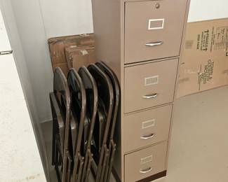 Tall middle final cabinet $30, eight metal folding chairs $75