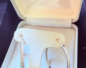 White 14kt gold and diamond hoop earrings 