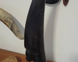 African Carved Horn Figurine of a Woman