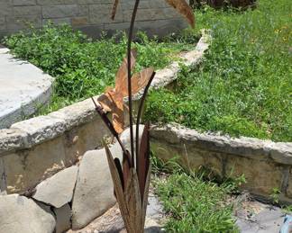 Cat tail and dragonfly metal statue