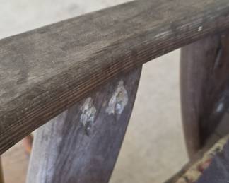 Rustic Wooden Rocking Chair with Sun-Stained Finish