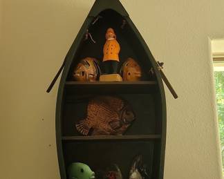 Dark Green Wooden Rowboat Shelf with Nautical Figurines