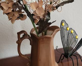 Brown Ceramic Pitcher with Dried Floral Arrangement and Metal Butterfly
