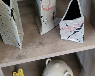 Abstract Ceramic Vases, Yellow Fish Figurine, and Grey Teapot