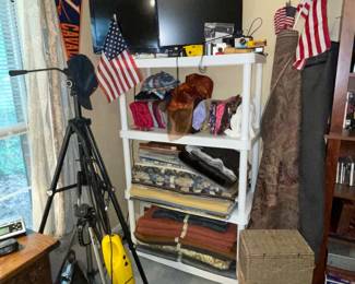 TVs, Cameras, Fabric samples, Tripods, Rolls of Fabric