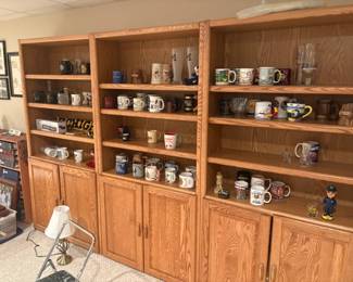. . . three bookshelves and mugs