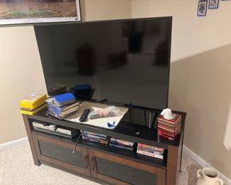 . . . flat-screen TV and nice TV stand