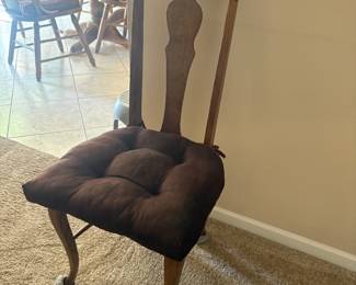 . . . early 1900's oak T-back chair