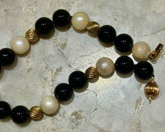 Pearl onyx and gold