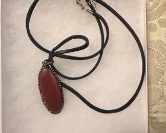 Oval Carnelian Pendant Necklace with Black CZ Accent on Leather Cord