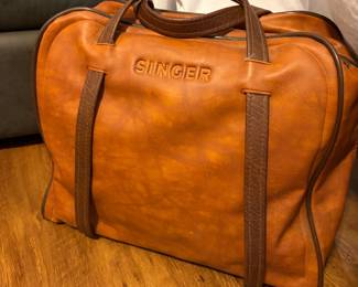 Singer sewing machine and leather bag