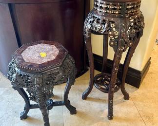 The tall pedestal is sold.