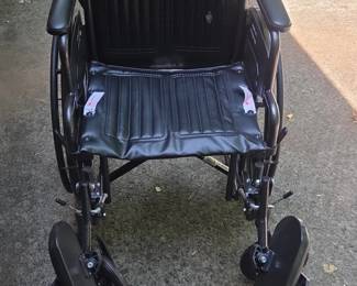 Large wheelchair with pads