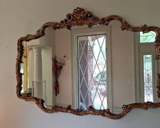 Mirror with gold painted frame