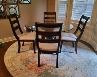 PRESALE - $400 STUNNING ASHLEY TRANSITIONAL-STYLE DINING SET FEATURING A SOLID THICK ROUND BEVELED EDGE GLASS TOP TABLE (48" DIAMETER)AND WITH STYLISH PEDESTAL WOOD EXPRESSO BASE AND 4 MATCHING LADDER BACK UPHOLSTERED CHAIRS 
