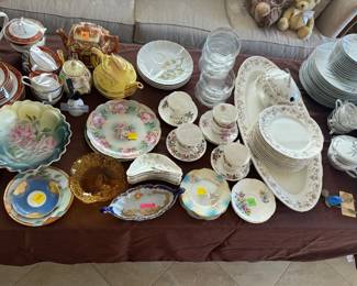 Lots of china and dishes
