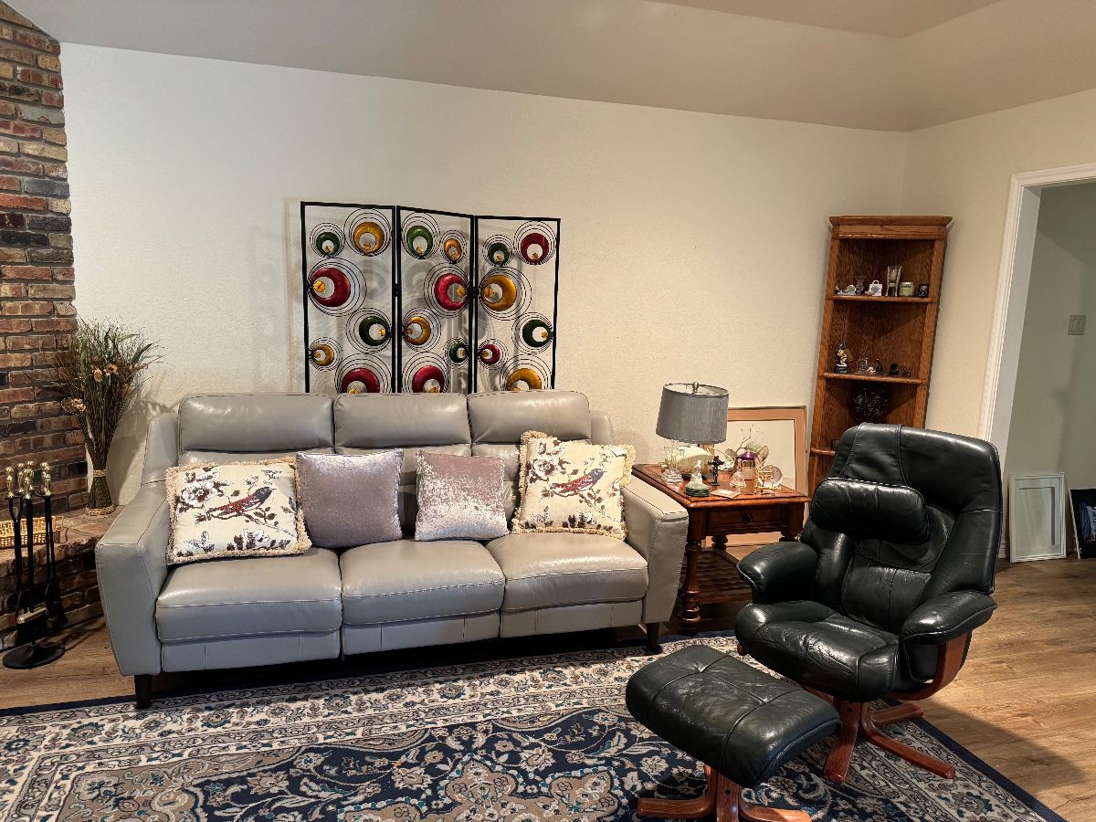 Gorgeous Leather Electric Power Recliner and has a matching Recliner chair. Swedish Modern Swiveling Lounge Chair and ottoman