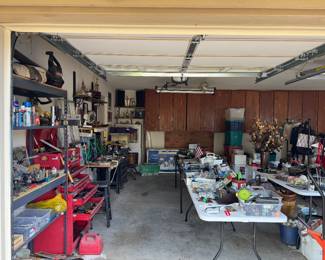 Garage filled with tools, holiday and household items