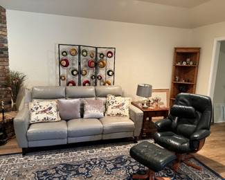 Gorgeous Leather Electric Power Recliner and has a matching Recliner chair. Swedish Modern Swiveling Lounge Chair and ottoman