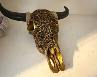 Ornate Gold-Toned Decorative Bull Skull with Embossed Patterns