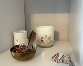 Decorative Shelf Display with Candles, Bowl, and Figurines