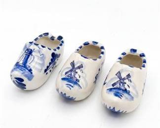 Three Blue and White Ceramic Shoe Figurines