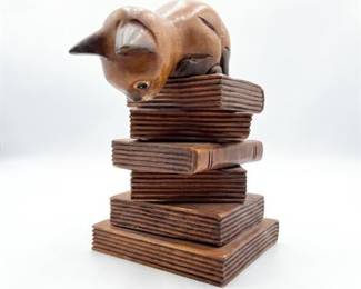 Hand-Carved Wood Cat Perched on Stacked Books