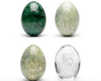 Three Polished Stone Eggs and Figural Glass Egg