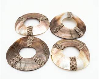 Four Mother-of-Pearl Shell Discs with Woven Fiber Bands