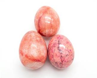 Three Carved Stone Eggs in Pink and Coral