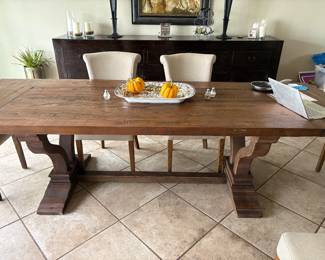 Large dining table with exterior leaves.  6-9 feet