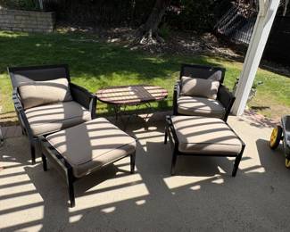 Four Brown Jordan wide patio chairs and two foot rests with premium fabric cushions