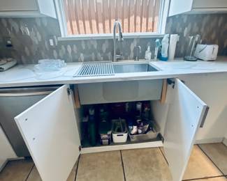 Great storage under cabinets to be rehomed