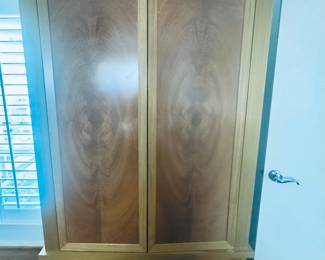 Handsome wardrobe filled with mens items