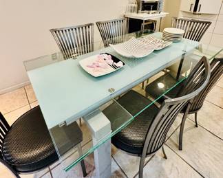 glass dining table features a tempered top and a sleek, chrome base. Late 20th Century Modern Shaver Howard Slatted Steel Back Dining Chairs Set of 6   